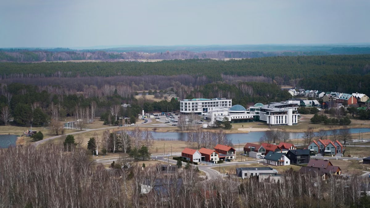 Explore Birštonas, Lithuania's mix of modern buildings and lush greenery from an aerial perspective.